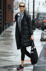 KARLIE KLOSS on a Rainy Day Out in New York 01/03/2017
