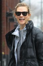 KARLIE KLOSS on a Rainy Day Out in New York 01/03/2017