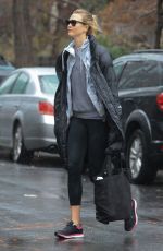 KARLIE KLOSS on a Rainy Day Out in New York 01/03/2017