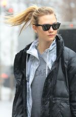 KARLIE KLOSS on a Rainy Day Out in New York 01/03/2017