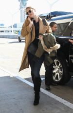 KATE UPTON at LAX Airport in Los Angeles 01/17/2017
