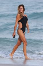 KELLY BENSIMON in Swimsuit on Miami Beach 01/14/2017