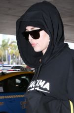KHLOE KARDASHIAN at LAX Airport in Los Angeles 12/23/2016
