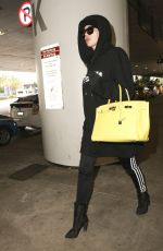 KHLOE KARDASHIAN at LAX Airport in Los Angeles 12/23/2016