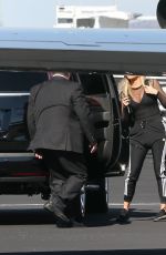 KHLOE KARDASHIAN Boarding a Private Jet in Los Angeles 01/26/2017