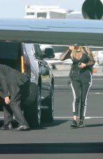 KHLOE KARDASHIAN Boarding a Private Jet in Los Angeles 01/26/2017