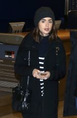LILY COLLINS Arrives in Salt Lake City 01/22/2017