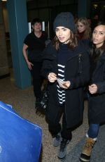LILY COLLINS Arrives in Salt Lake City 01/22/2017