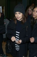 LILY COLLINS Arrives in Salt Lake City 01/22/2017