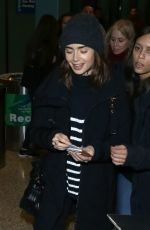 LILY COLLINS Arrives in Salt Lake City 01/22/2017