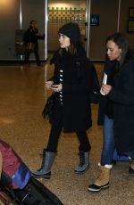 LILY COLLINS Arrives in Salt Lake City 01/22/2017