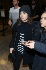 LILY COLLINS Arrives in Salt Lake City 01/22/2017