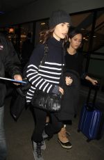 LILY COLLINS at LAX Airport in Los Angeles 01/23/2017