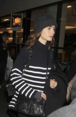 LILY COLLINS at LAX Airport in Los Angeles 01/23/2017