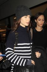 LILY COLLINS at LAX Airport in Los Angeles 01/23/2017