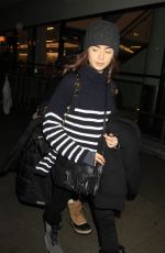 LILY COLLINS at LAX Airport in Los Angeles 01/23/2017