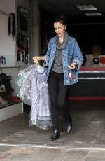 LILY COLLINS Leaves Dry Cleaners in Beverly Hills 01/05/2017