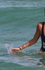 MADISON BEER in Swimsuit at a Beach in Miami 01/03/2017