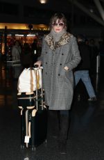 MILLA JOVOVICH at JFK Airport in New York 01/25/2017