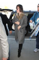 MILLA JOVOVICH at Los Angeles International Airport 01/25/2017