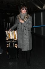 MILLA JOVOVICH at Los Angeles International Airport 01/25/2017