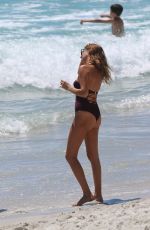 MILLIE MACKINTOSH in Swimsuit at a Beach in Cape Town 12/31/2016