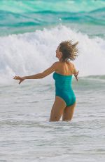 NAOMI WATTS in Swimsuit at a Beach in Cancun 01/01/2017