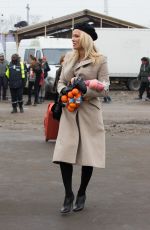 PAMELA ANDERSON at a Refugee Camp in Grande-synthe 01/25/2017