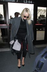 PAMELA ANDERSON at Los Angeles International Airport 01/18/2017