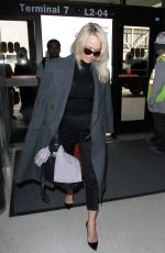 PAMELA ANDERSON at Los Angeles International Airport 01/18/2017
