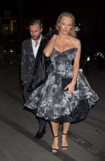 PAMELA ANDERSON Leaves Four Seasons George V Hotel in Paris 01/27/2017