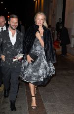 PAMELA ANDERSON Leaves Four Seasons George V Hotel in Paris 01/27/2017