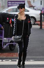 PARIS HILTON at Heathrow Airport in London 01/30/2017