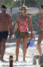 PARIS HILTON in Swimsuit at a Beach in Cancun 01/09/2017