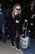 SABRINA CARPENTER at LAX Airport in Los Angeles 01/12/2016
