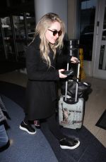 SABRINA CARPENTER at LAX Airport in Los Angeles 01/12/2016
