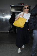 SIENNA MILLER Arrives at LAX Airport in Los Angeles 01/05/2017