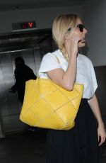 SIENNA MILLER Arrives at LAX Airport in Los Angeles 01/05/2017