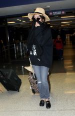 VANESSA HUDGENS at LAX Airport in Los Angeles 01/08/2017