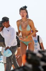 BELLA THORNE and Friends in Bikinis at a Beach in Cancun 02/16/2017