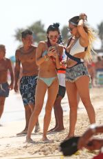 BELLA THORNE and Friends in Bikinis at a Beach in Cancun 02/16/2017