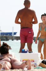 BELLA THORNE and Friends in Bikinis at a Beach in Cancun 02/16/2017