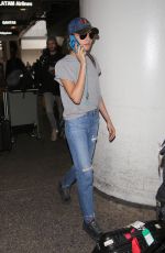 CARA DELEVINGNE at Los Angeles International Airport 02/27/2017