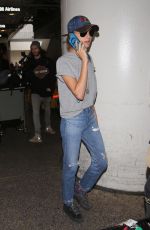 CARA DELEVINGNE at Los Angeles International Airport 02/27/2017