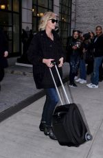 CHARLIZE THERON Out and About in New York 02/08/2017