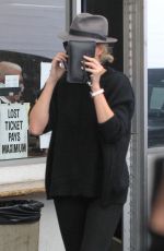 CHARLIZE THERON Out in Beverly Hills 02/21/2017
