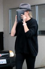 CHARLIZE THERON Out in Beverly Hills 02/21/2017