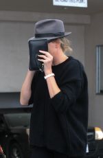 CHARLIZE THERON Out in Beverly Hills 02/21/2017