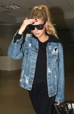 CHARLOTTE MCKINNEY at LAX Airport in Los Angeles 02/20/2017