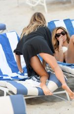CHARLOTTE MCKINNEY in Bikini at a Beach in Miami 02/16/2017